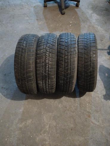 Комплект из 4 автомобильных шин. Параметры: - Размер: 145/70 R13 -