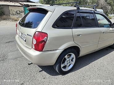 шторка фит: Mazda 323: 2003 г., 1.6 л, Механика, Бензин, Универсал — 3