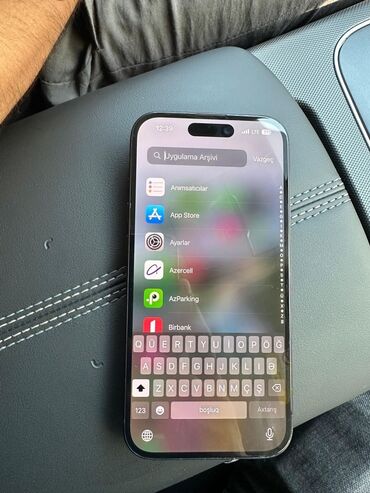 Apple iPhone: IPhone 15, 128 GB, Qara, Simsiz şarj, Face ID