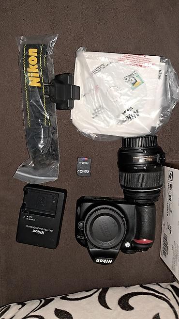 vr açki: Nikon D3100 DSLR fotoaparat dəsti Komplekt: - Nikon D3100 gövdə (14.2 — 2