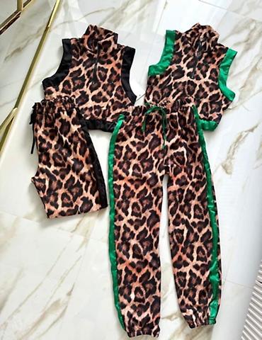pantalone mona: Damski komplet – prsluk top i pantalone sa animal printom
1900 din — 4
