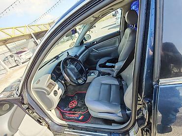 changan disk: Volkswagen Passat sedan. Avtomobil tünd göy rəngdədir və klassik — 1