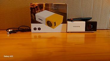proektor satilir: LED mini proyektor - Kompakt və yüngül korpus: ağ-qara dizayn — 1