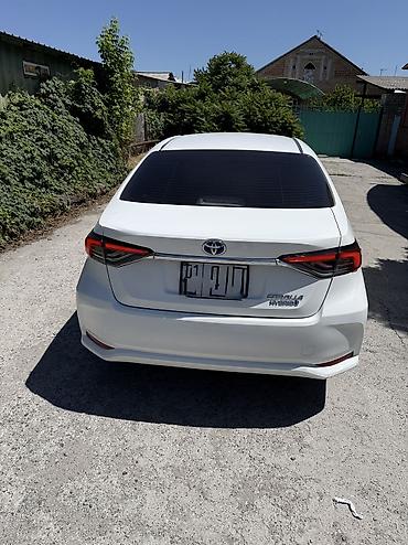 voxy noah: Toyota Corolla: 2019 г., 1.8 л, Вариатор, Гибрид, Седан — 10