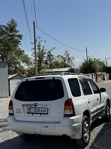 диск на фуру: Mazda Tribute: 2002 г., 2 л, Автомат, Газ, Кроссовер — 1
