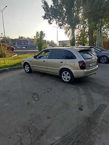 Mazda: Mazda 323: 2002 г., 1.6 л, Механика, Бензин, Универсал — 4