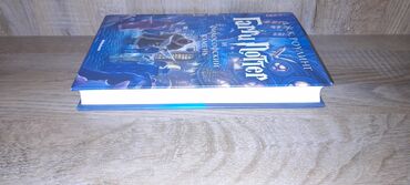 Digər kitablar və jurnallar: Harry Poter və filosof daşı adlı kitabı rus dilində Dj.K.Roulinq in — 10