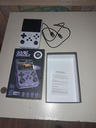 tv android box: Retro əl oyun konsolu – R36S Xüsusiyyətlər: - Model: R36S (qutu — 1