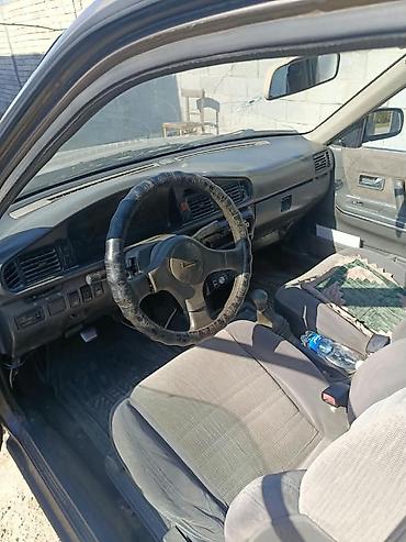 электро гелик китай: Mazda 626: 1991 г., 2 л, Механика, Бензин, Универсал — 3