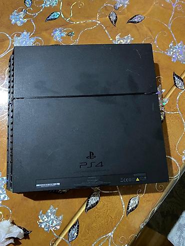 ps konsolu: Sony PlayStation 4 (PS4) oyun konsolu Xüsusiyyətlər: - Model: PS4 — 1