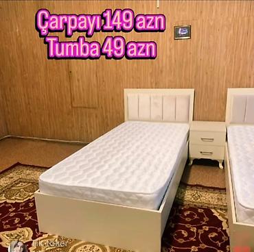 tumbalar: Ağ rəngli tək nəfərlik çarpayı və uyğun tumbadan ibarət dəst. - — 1