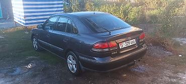 e6 3: Mazda 626: 1998 г., 2 л, Механика, Бензин, Седан — 4