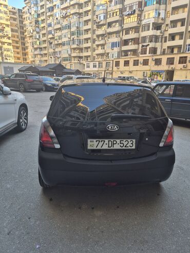 Kia: Kia Rio: 1.4 l | 2009 il Sedan — 21