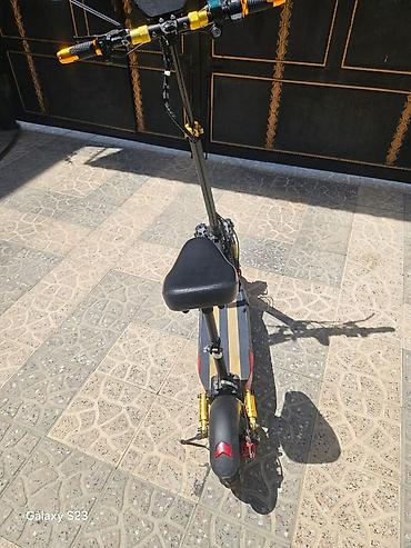 Электротранспорт: Elektrikli skuter – oturacaqlı model Xüsusiyyətlər: - Güclü ön ikili — 4