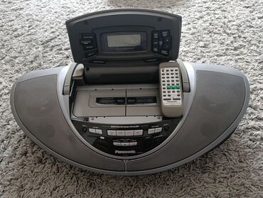 колонку: Портативная аудиосистема Panasonic с CD-плеером, кассетной декой и