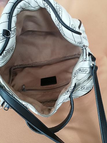 obag srbija: DUKI DASO manja tasna sa printom loga. Ima dve pregrade pa je vrlo — 3