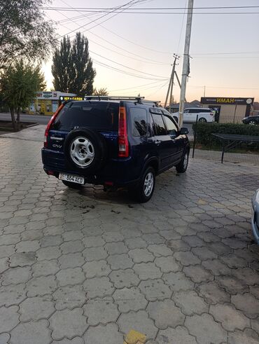 домкрат воздушный: Honda CR‑V (2-е поколение), темно-синий кроссовер. Кузов и экстерьер