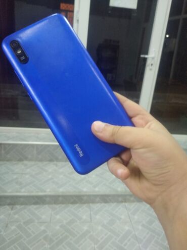 islenmis telefonlar satisi: Xiaomi Redmi 9A, 32 GB, rəng - Mavi, 
 İki sim kartlı, Face ID