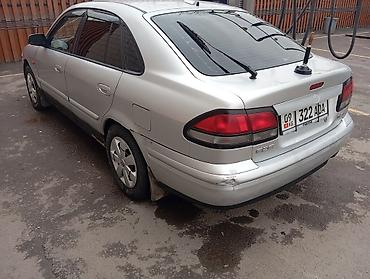 Mazda: Mazda 626: 2000 г., 1.8 л, Механика, Бензин, Хэтчбэк at lalafo.kg — 4 Mazda: Mazda 626: 2000 г., 1.8 л, Механика, Бензин, Хэтчбэк — 4