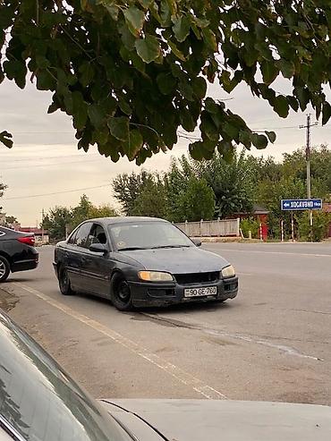 maşin siqnali: Opel Omega: 2 l | 1994 il 42500 km Sedan — 5