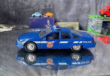 скупка масштабных моделей автомобилей: Коллекционная модель Chevrolet Caprice IV Police 1990 Welly Scale