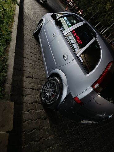 Opel: Opel Meriva, gümüşü rəngli, 5 qapılı kompakt minivan. Xüsusiyyətlər — 14