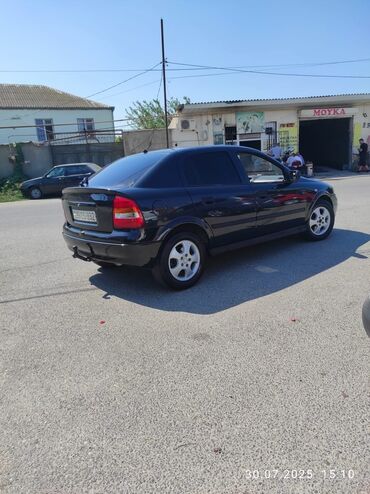Opel Astra: 1.8 л | 1998 г. 257500 км Хэтчбэк