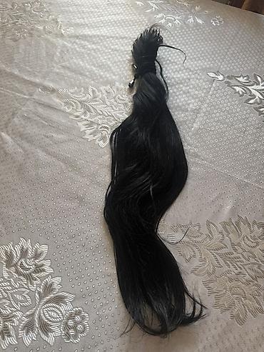 Təbii insan saçı – qara rəngdə, uzun topa - Material: 100% təbii