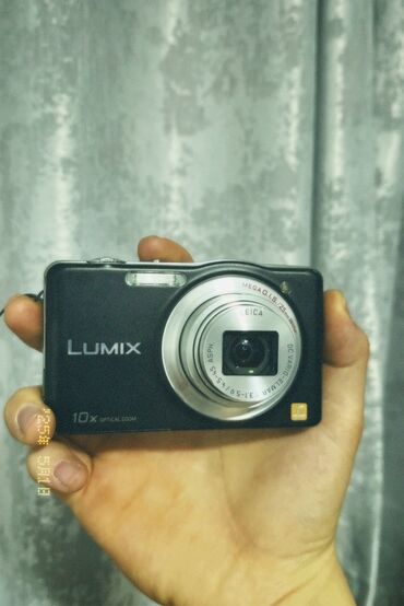 сотовый телефон fly ts113 черный: Компактная цифровая фотокамера Panasonic Lumix DMC-SZ1 в черном