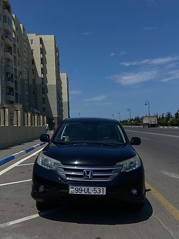 4 lu canta: Honda CR-V krossover, qara rəngdə, geniş və rahat salonlu modeldir — 4