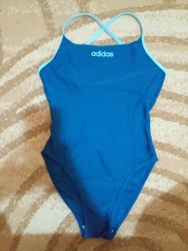 kupaći kostimi 2022 za punije: M (EU 38), Single-colored, color - Light blue