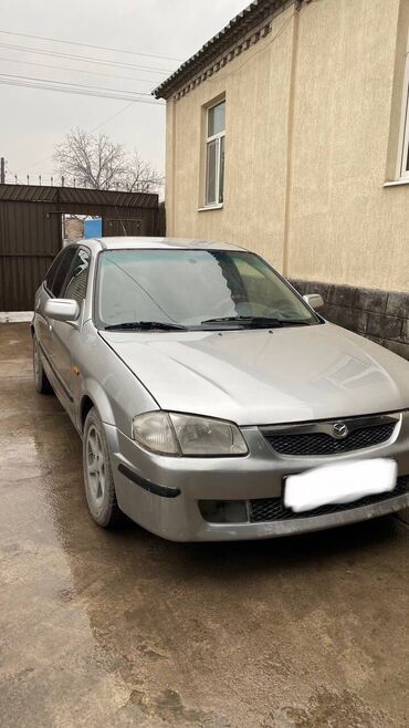 машины новые: Mazda 323: 1998 г., 1.6 л, Механика, Бензин, Седан