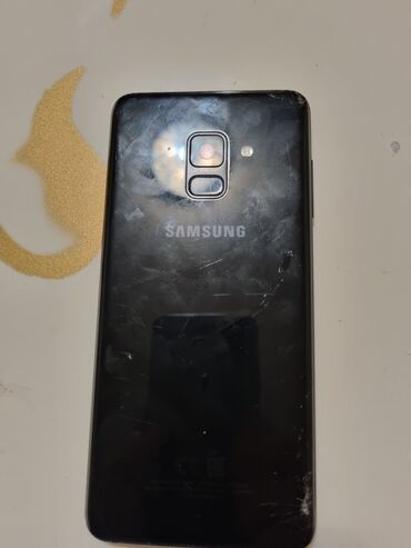 телефон fly б: Samsung Galaxy A8, 32 ГБ, цвет - Черный, Отпечаток пальца