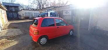 аккумулято: Daihatsu Cuore: 1996 г., 0.8 л, Механика, Бензин, Купе — 2