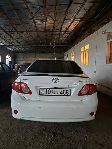 toyota aygo: Toyota Corolla (E140), ağ rəng, sedan gövdə. Xarici: - Orijinal — 1