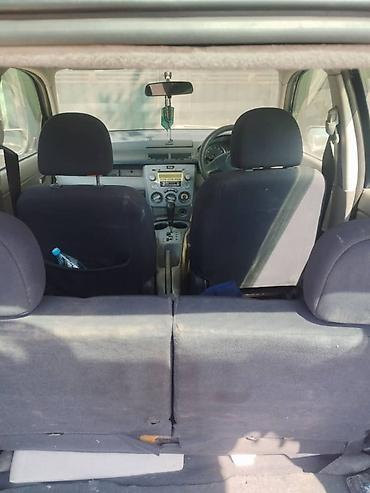 mazda 323 f: Mazda Demio: 2002 г., Автомат, Бензин, Хэтчбэк — 8