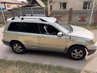 byd e2 2024: Mitsubishi Outlander: 2003 г., 2.4 л, Автомат, Бензин, Кроссовер — 3