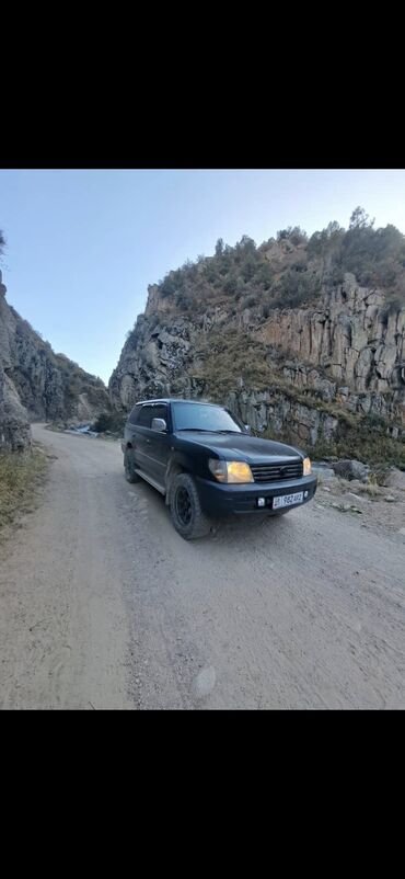 семиместные машины: АРАБ 2 БАКА Toyota Land Cruiser 100 ( левый руль ). Полноразмерный