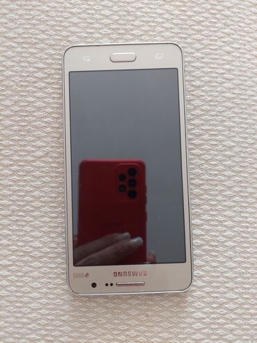 роял флай телефон: Samsung Galaxy Grand, 8 GB, rəng - Qızılı, İki sim kartlı