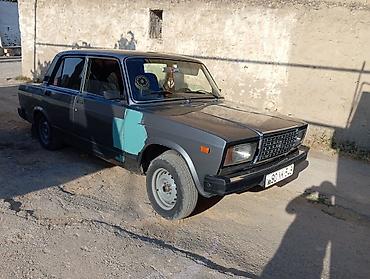 VAZ (LADA): Model: Lada 2107 sedan Rəng: Tünd boz/göy tonları Kuzov: 4 qapı — 2