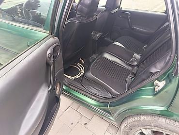 kredit avtomobil: Opel Vectra sedan – tünd yaşıl rəng, 4 qapı, 5 yerlik. Şəhər və tras — 9