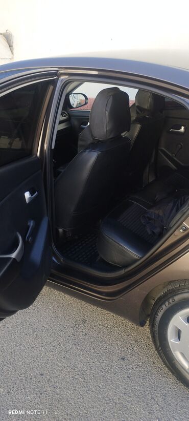 Kia: Kia Rio sedan - Korpus: 4 qapılı sedan, tünd qəhvəyi rəng - Kuzov — 7