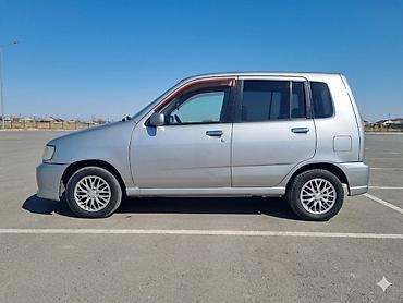 растрочка машина: Nissan Cube: 2000 г., 1.3 л, Автомат, Бензин, Минивэн — 3