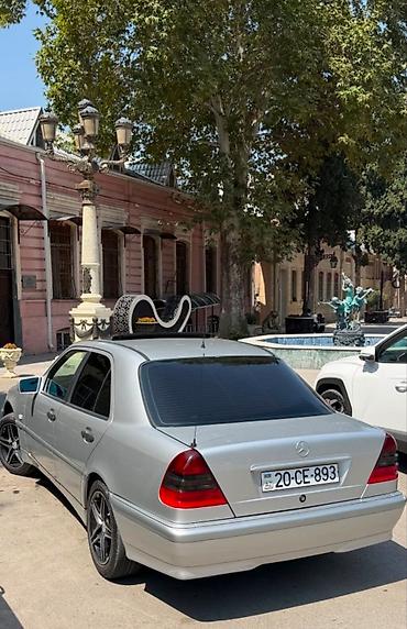 cls 63 amg: Mercedes-Benz C-Class: 1.8 l | 1997 il Sedan — 4