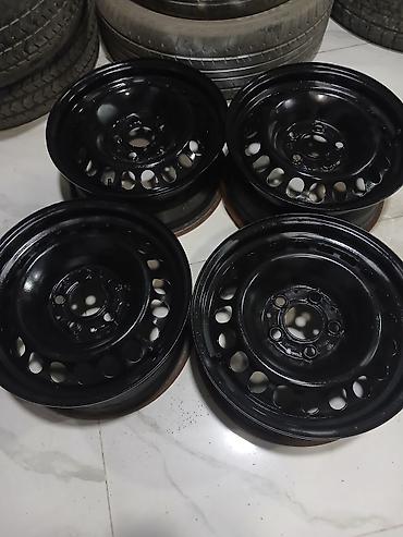 Disklər: Tecili satlir: 4 ədəd qara rəngli5 bolt polad disk komplekti - — 2
