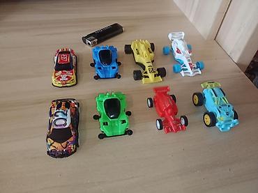 Игрушки: Набор игрушечных транспортных средств Состав: - Большой автовоз с — 8