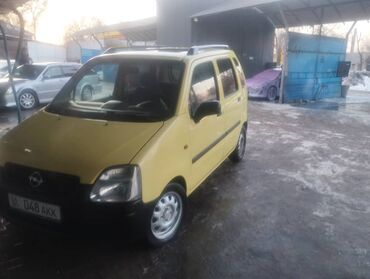 фары для гольф 2: Желтый минивэн Opel Agila, компактный автомобиль, предназначенный для