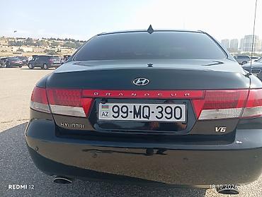 e class 220: Hyundai Grandeur: 3.3 l | 2008 il Sedan — 2