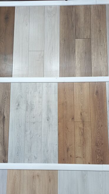 Laminat: Məhsul: Laminat döşəmə örtükləri və aksesuarları Təsvir: - Mağazada — 8
