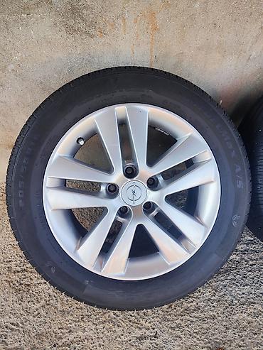 opel r16: Opel orijinal yüngül lehimli disklər və şinlər komplekti - Disklər — 1